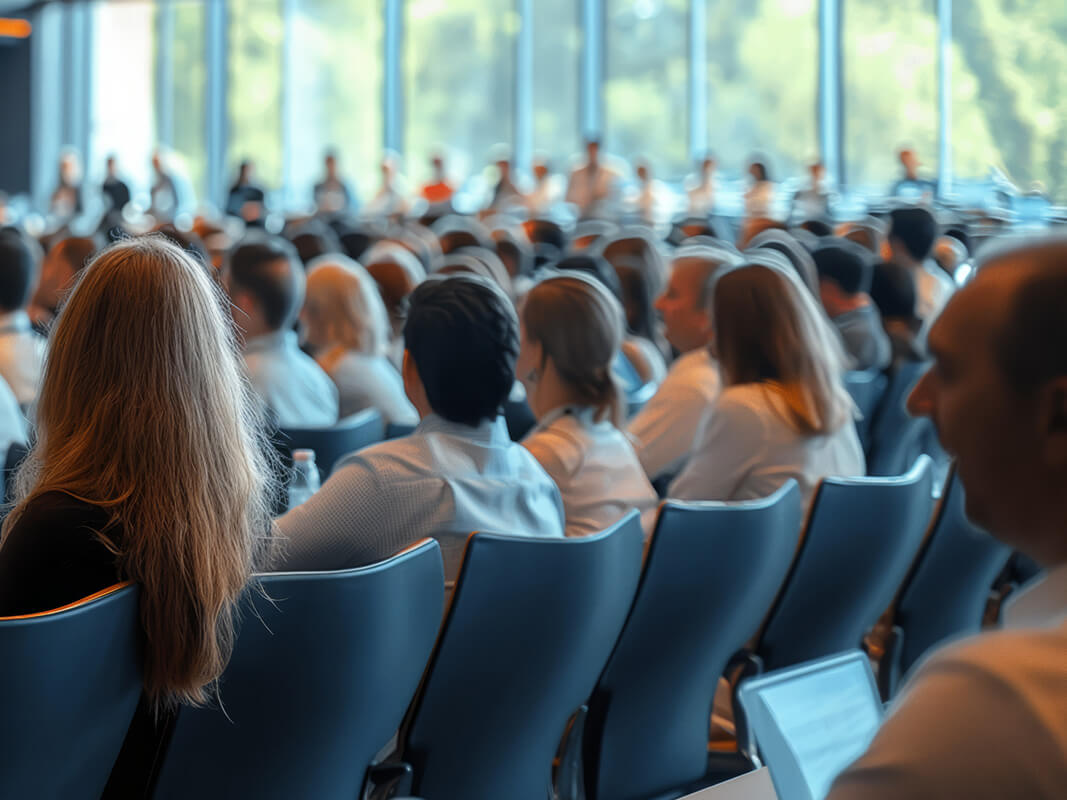 People sitting at the large event